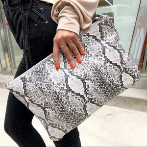 Envelope clutch bag snake print